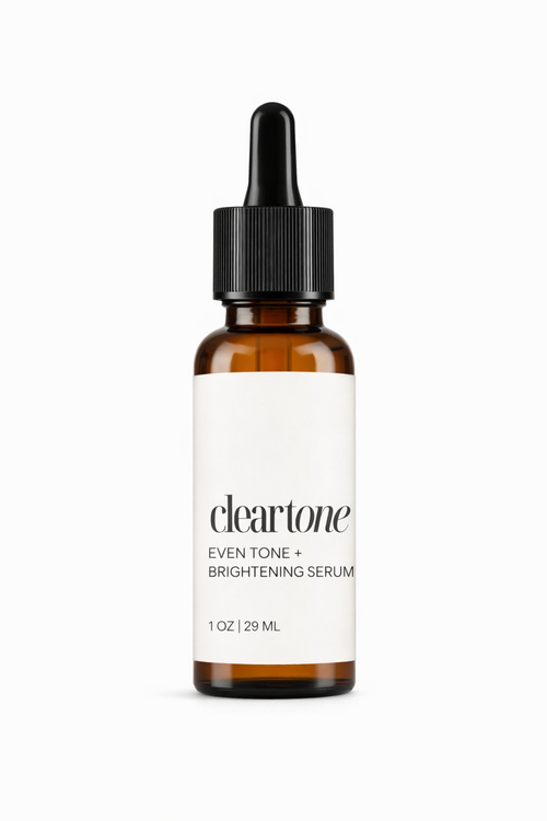 Brown serum bottle with white label on a white background