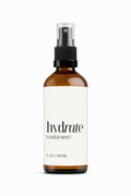 Brown bottle of hydrate toner mist on a white background